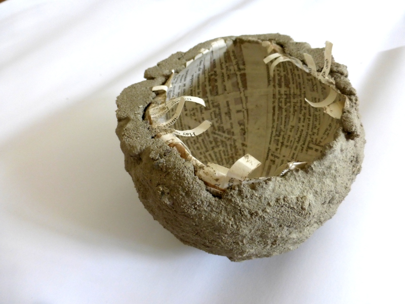 one half of the story. bowl made from concrete and book pages. Ines Seidel