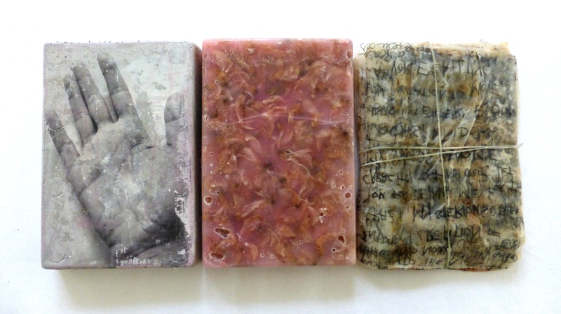 verses, unsung. concrete, wax, dried blossoms, teabags and other material. Ines Seidel
